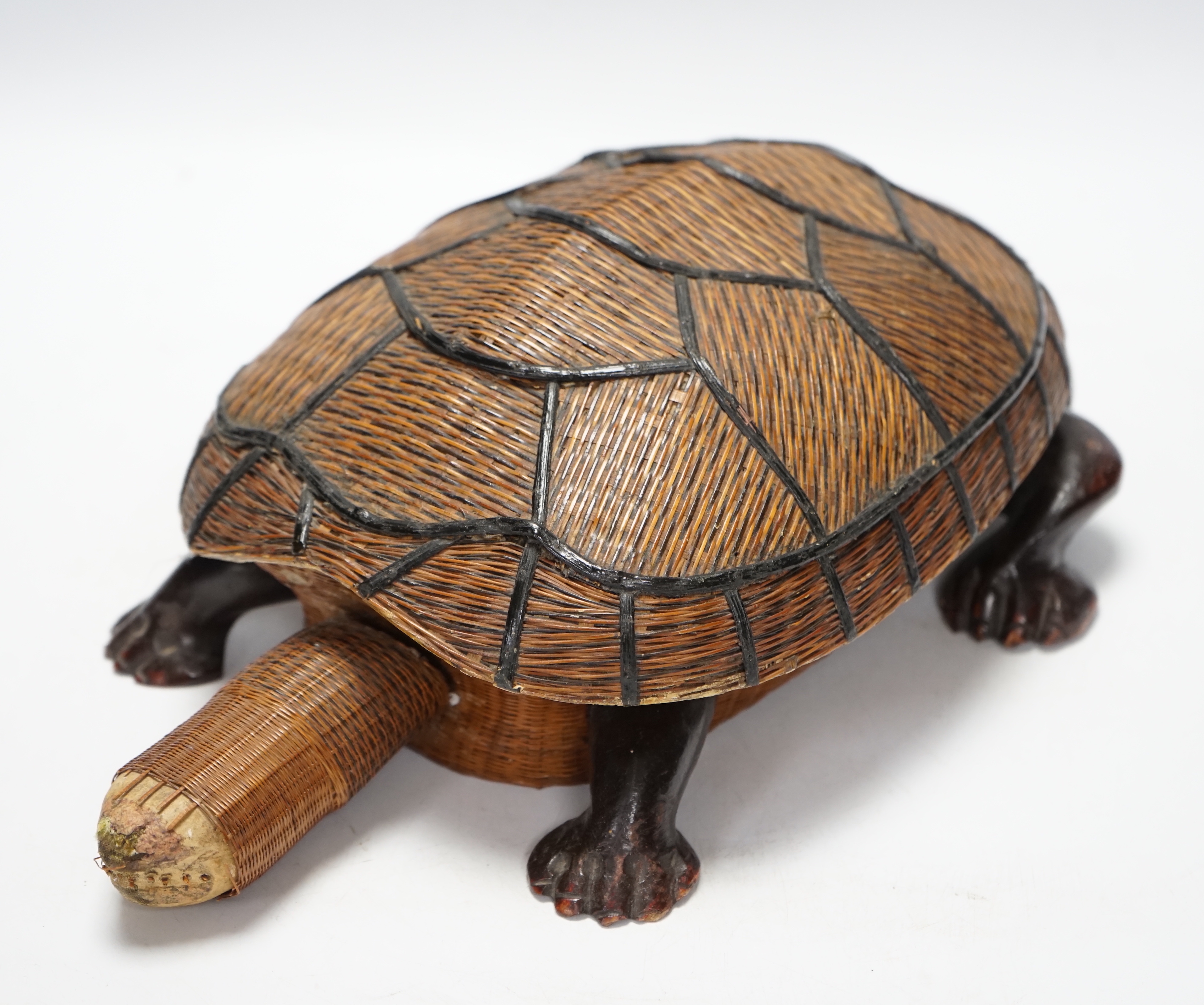 A collection of Chinese Soapstone carvings and a straw woven novelty tortoise shaped basket, basket 35cm long